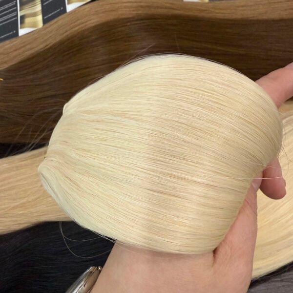 Cuticle-aligned virgin hair Genius Weft extensions for salon use